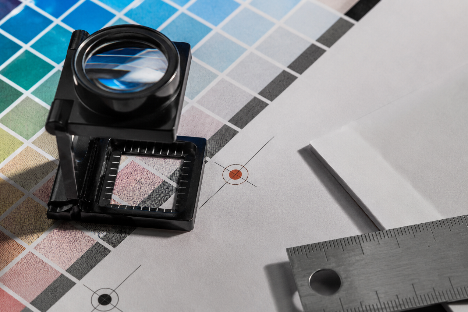 Printer inspection loupe on a detailed color proof